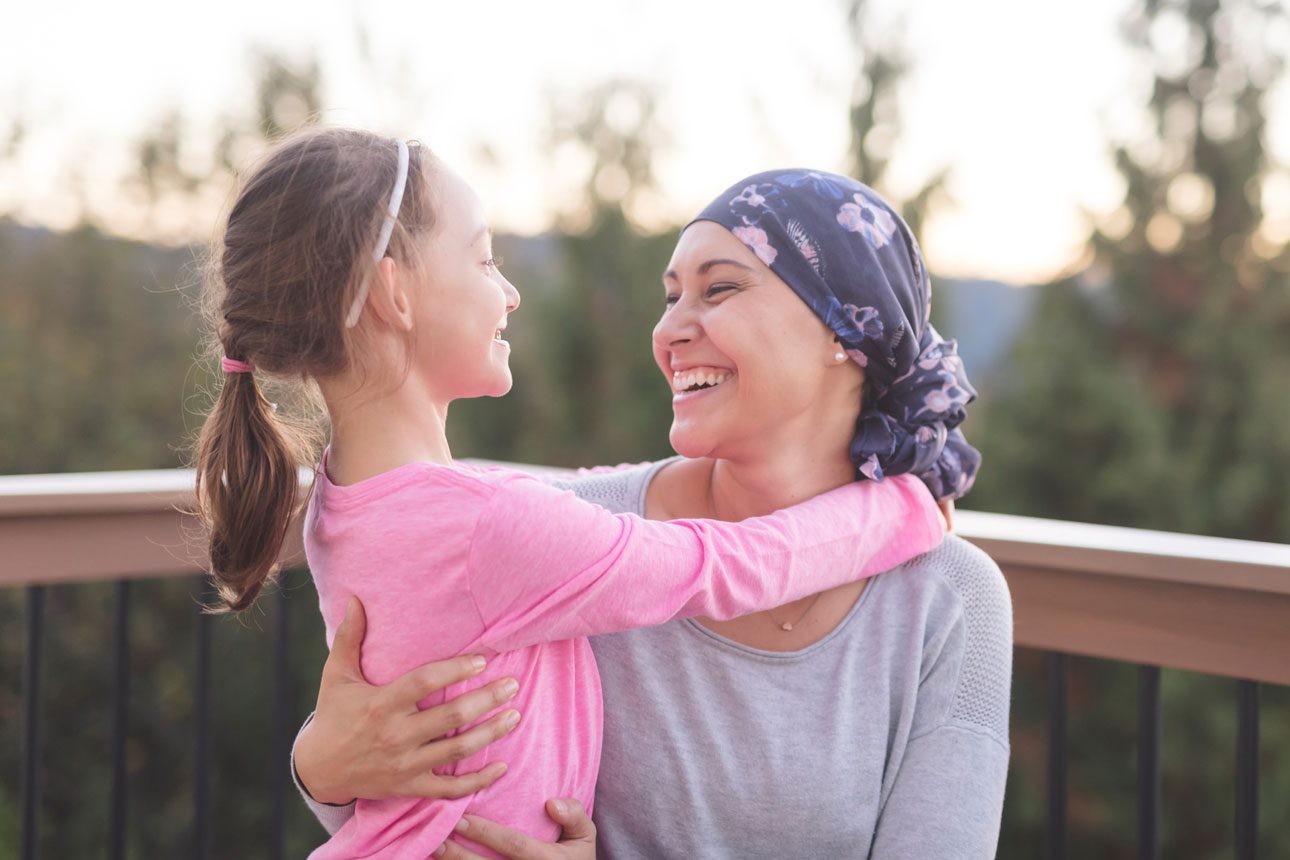 daughter and mother laughing